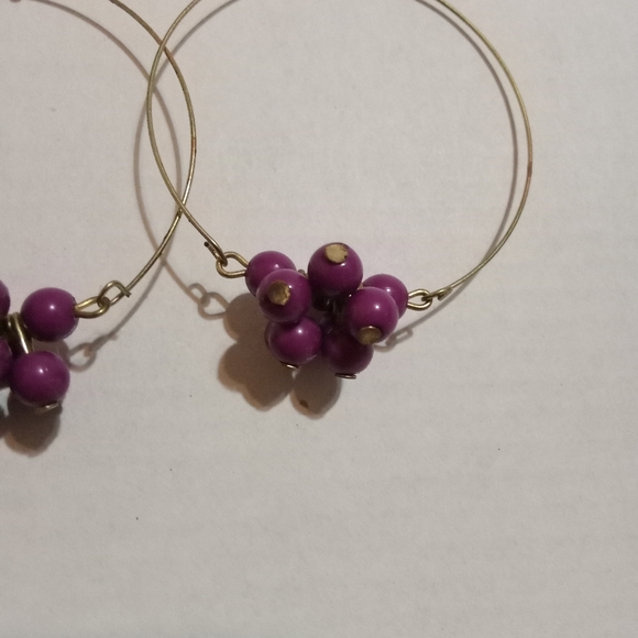 Hoop earrings with purple beating on the bottom - Picture 3 of 3